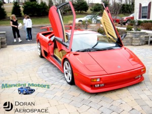 Lamborghini doors. Amazing. Front left view.